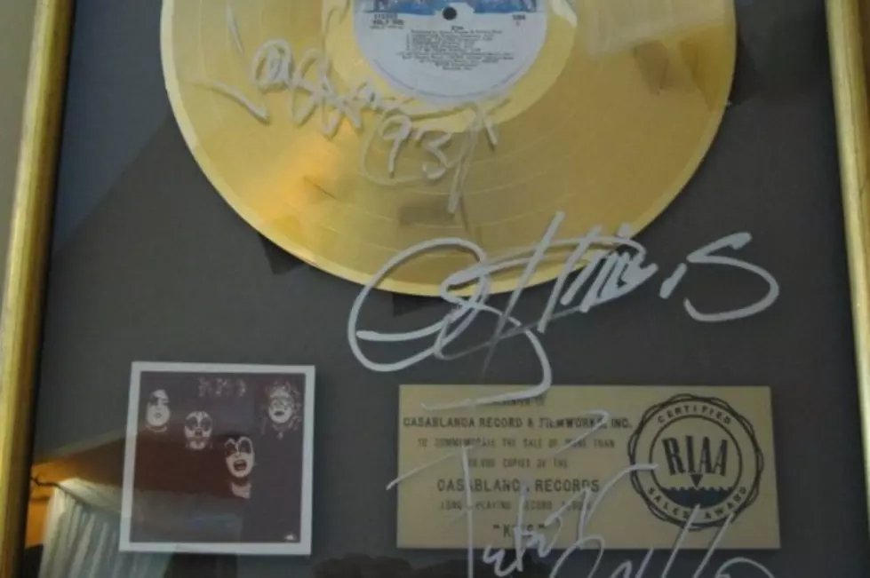 Kiss Autographed Gold Record Sells for Big Bucks