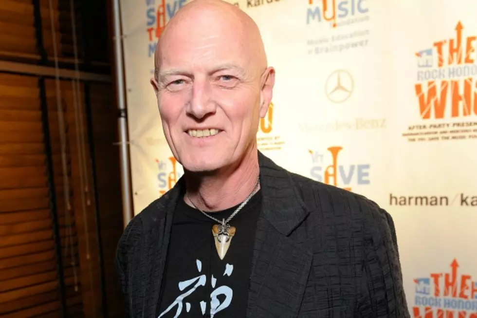 Chris Slade Reveals the Reason He Quit AC/DC, Hints at Firm Reunion