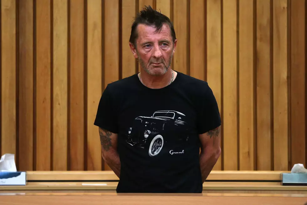 Phil Rudd Back in Handcuffs After Fight, Possible Car Chase