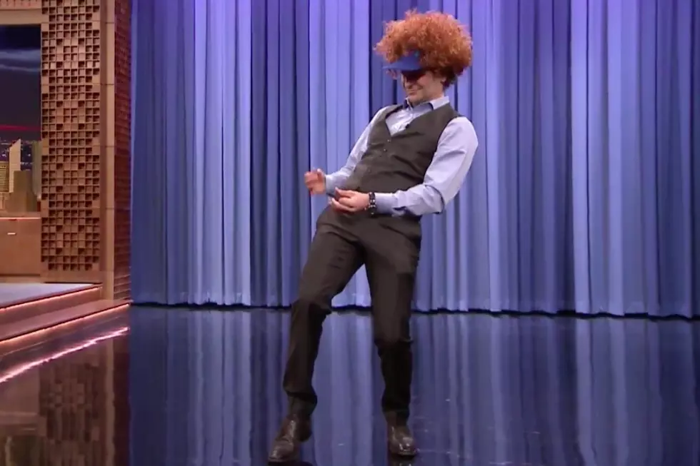Watch Bradley Cooper Play Air Guitar to a Neil Young Classic