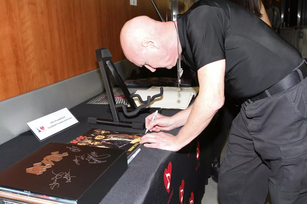 Chris Slade Photographed With AC/DC At Grammy Event