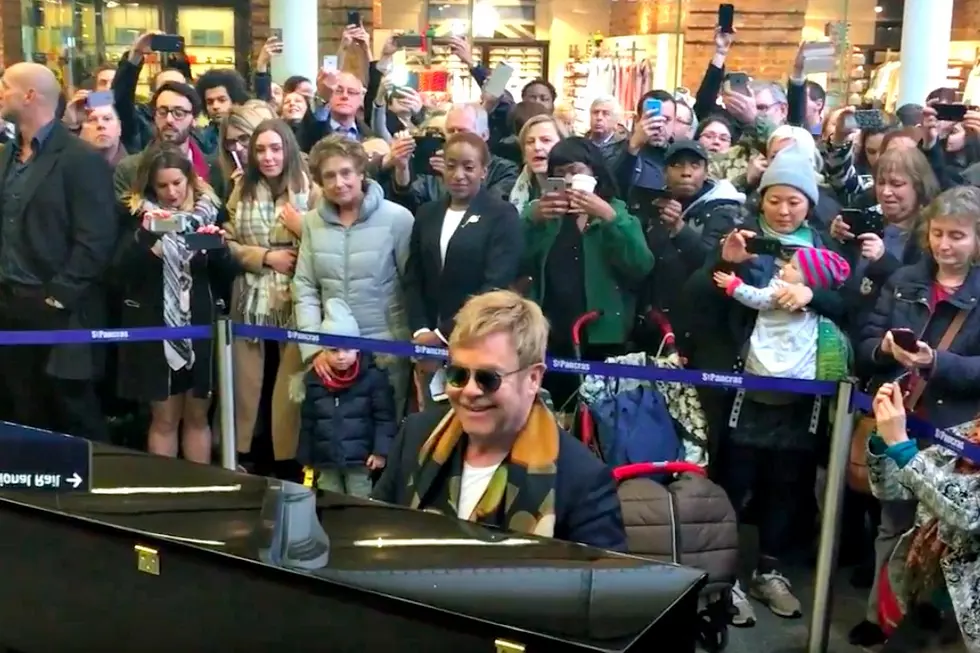 Watch Elton John Deliver a Surprise Performance of ‘Tiny Dancer’ at a London Train Station