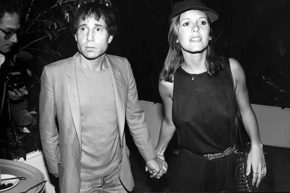 Inside Carrie Fisher’s Turbulent, Inspirational Relationship with Paul Simon