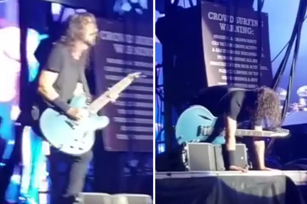 Watch Dave Grohl Trip Onstage