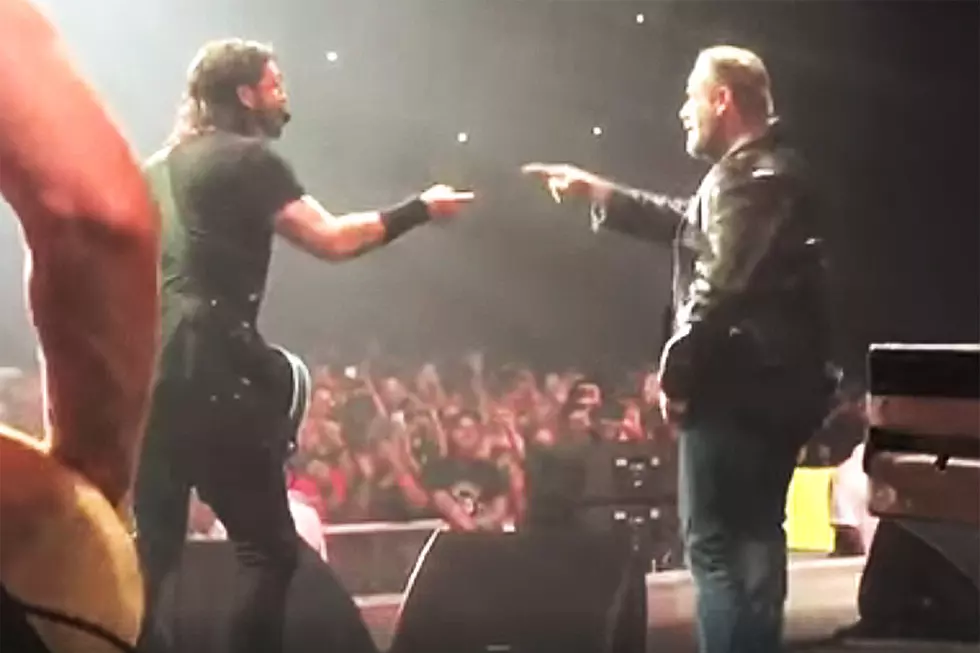 John Travolta, Chad Smith Dance and Perform with Foo Fighters