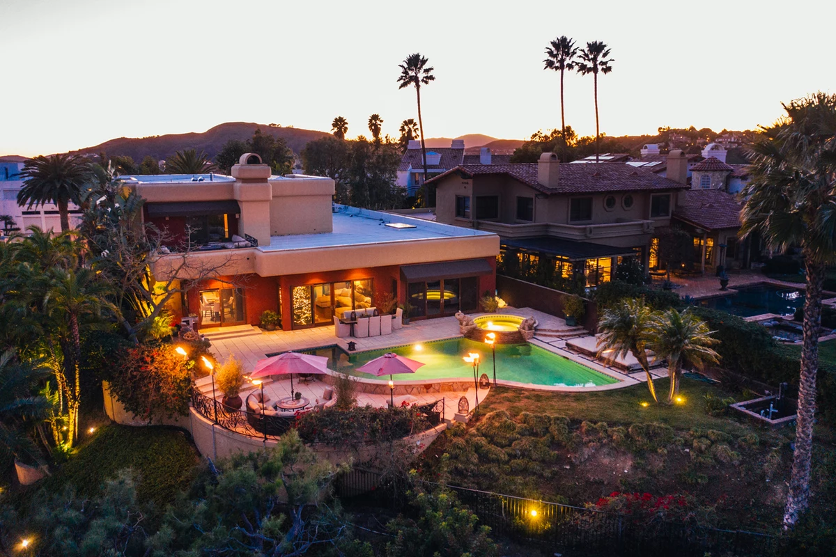 Fireplace mediterranean stone fireplaces wood mantels custom miami living stacked plans classic marylyonarts See 43 Photos of the Newly Renovated House Tommy Lee Is Selling