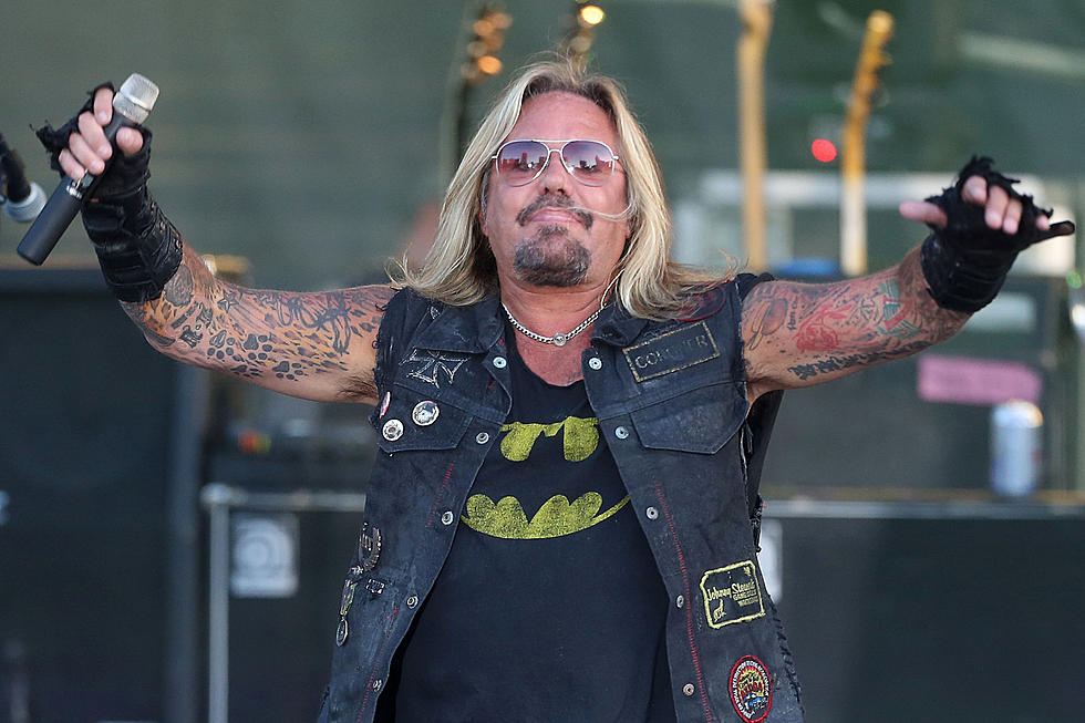 Vince Neil Injured After Falling Off Stage