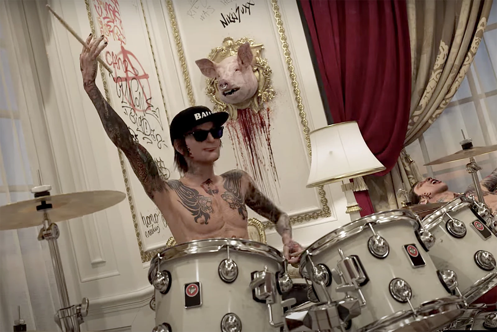 Tommy Lee Launches NSFW Video for Manic Track ‘Bouncy Castle’