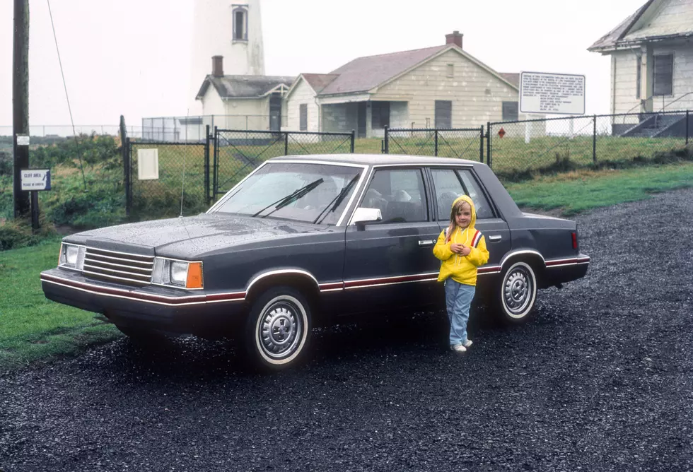 Girl With Dodge Aries sedan