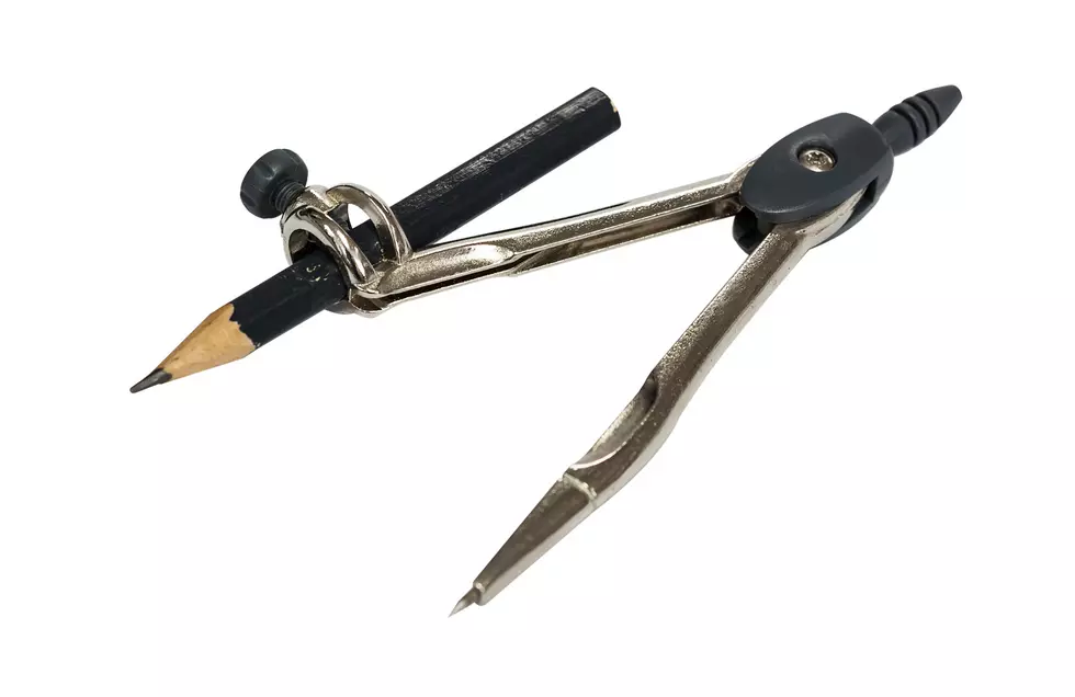 A Compass With Pencil