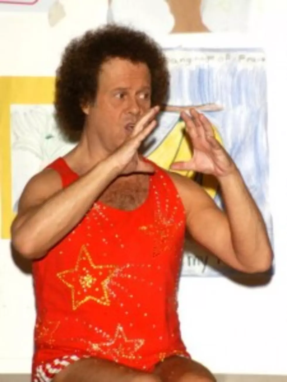 Richard Simmons Delivers Your In-Flight Safety Tips [Video]