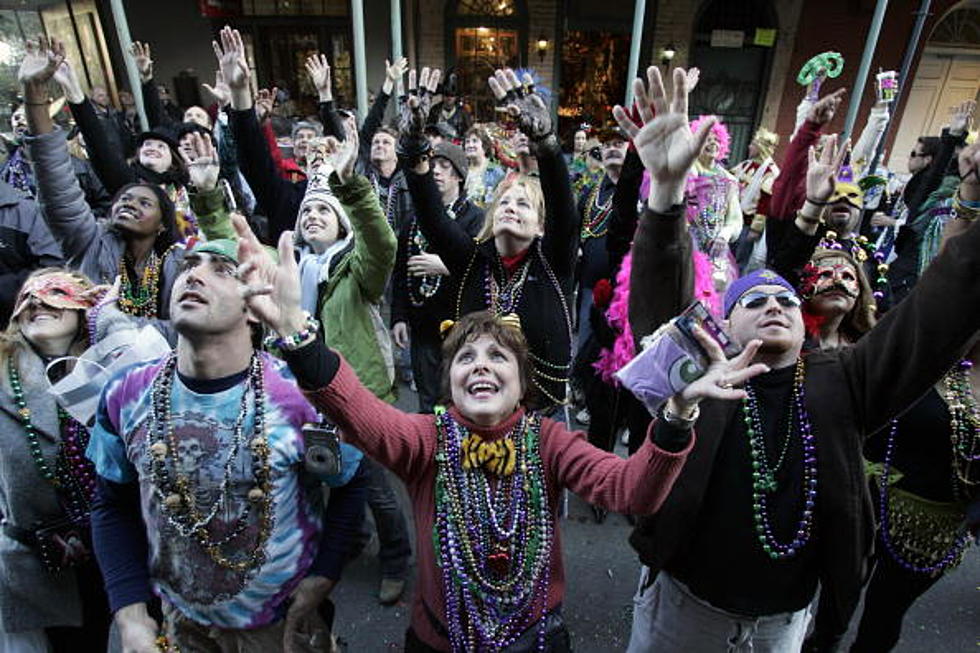 Your Step-by-Step Guide on How to Catch the Most Mardi Gras Beads