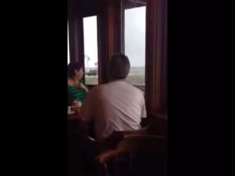 Huge Wave Crashes Through Restaurant and Drenches Customers [Video]