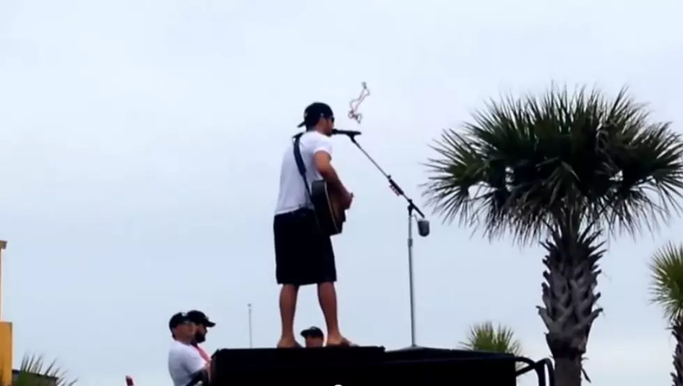 Luke Bryan Gets Hit In The Face By Mardi Gras Beads [Video]