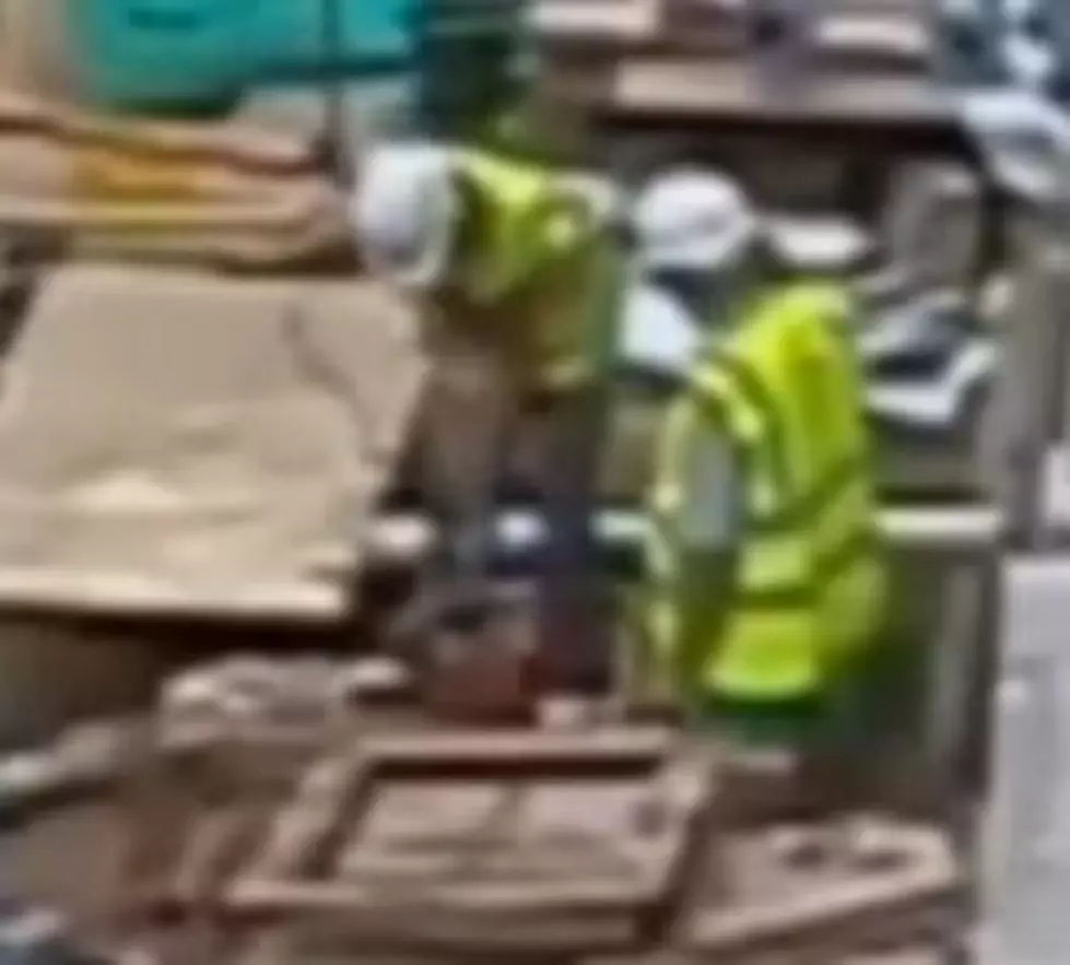 Worker Drills Through 11,000 Volt Power Cable [Video]