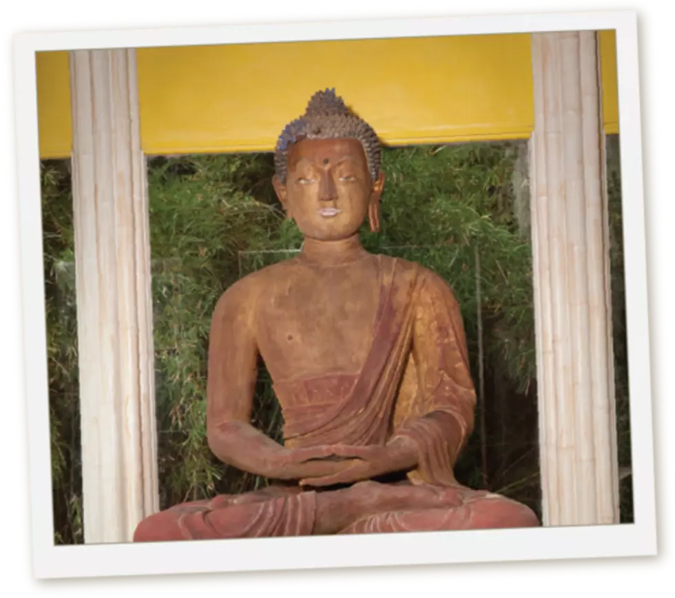 The Story Behind the 900-Year-Old Buddha Statue at Avery Island’s Jungle Gardens