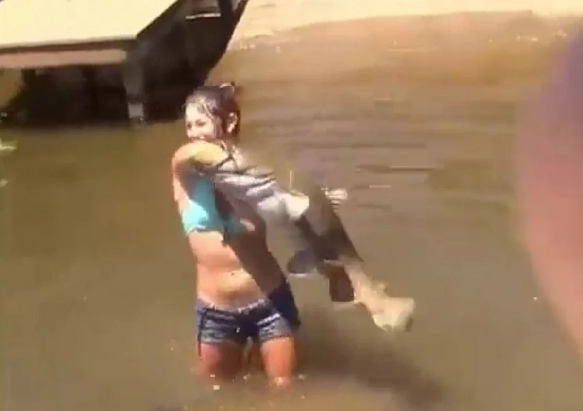 Girl Goes Noodling And Pulls Up A Huge Catfish [Video]