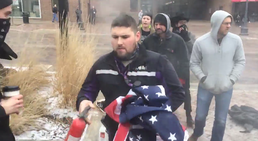 Viral Video Of FedEx Driver Matt Uhrin Saving An American Flag Being Burned By Protesters [Video]
