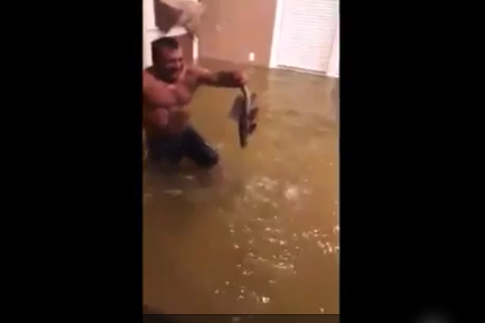 Houston Man Catches Fish Swimming Through His Flooded Home [Video]