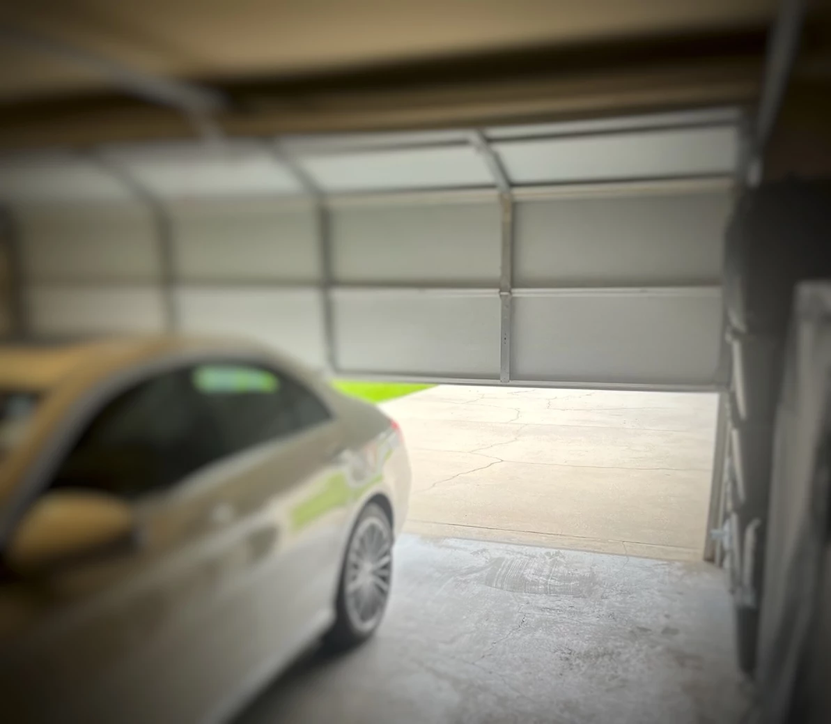 Does a Half Open Garage Door Mean Someone is a Swinger? pic
