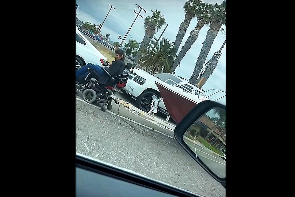 Man Tows Boat Through Traffic With Mobility Scooter [Watch]