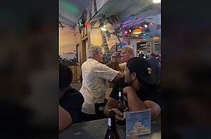 Drunk Man Fights His Own Reflection at Karaoke Bar