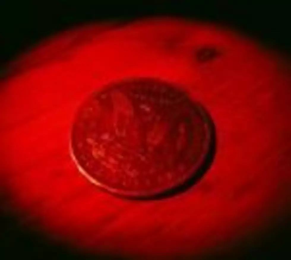 Red Painted Quarter In Your Change? What That Means