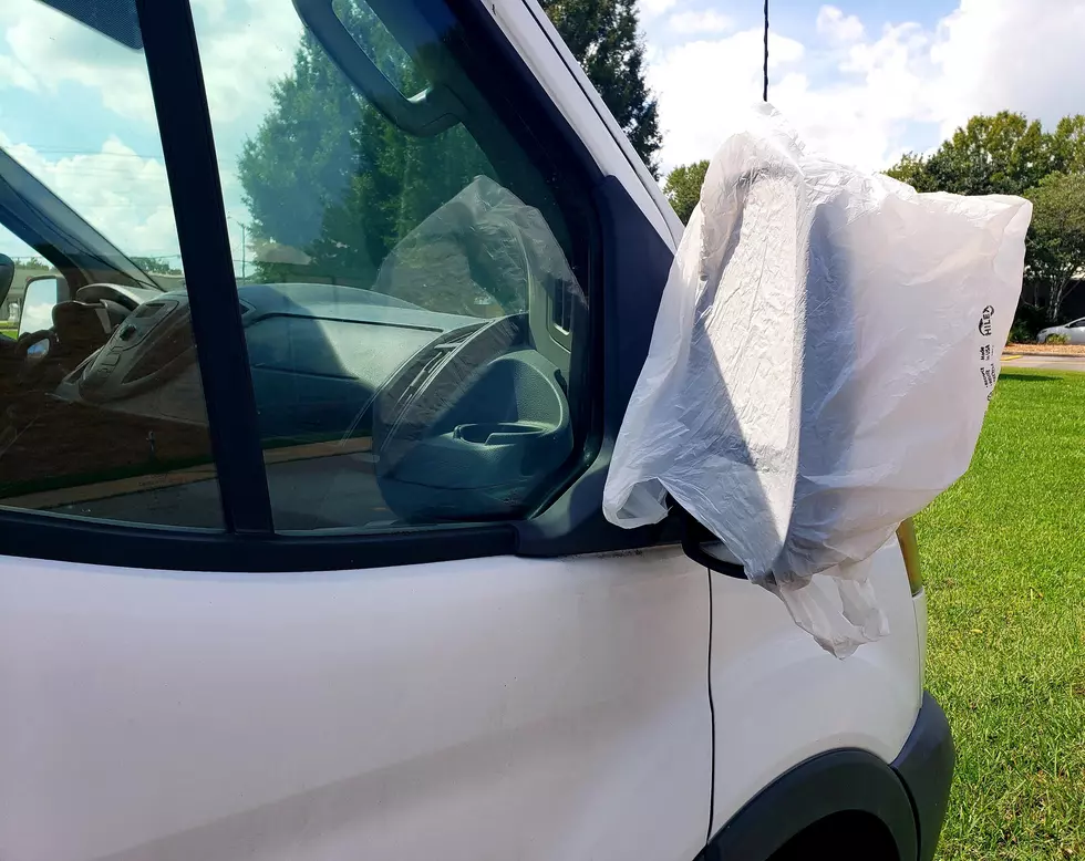 plastic bag on car's side mirror