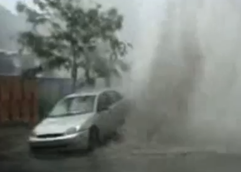 Manhole Explosion Lifts Parked Car [VIDEO]