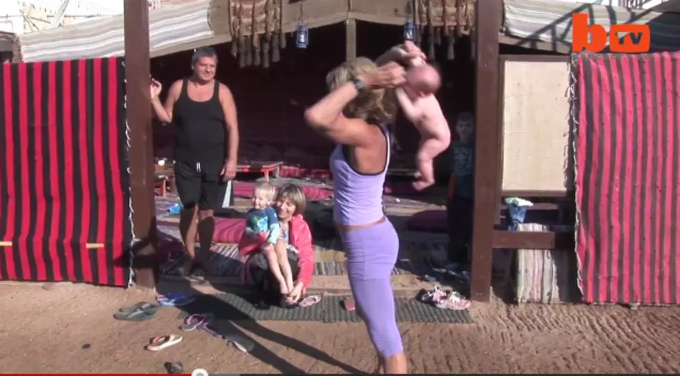 Crazy Yoga Lady Swings Baby Around [VIDEO]