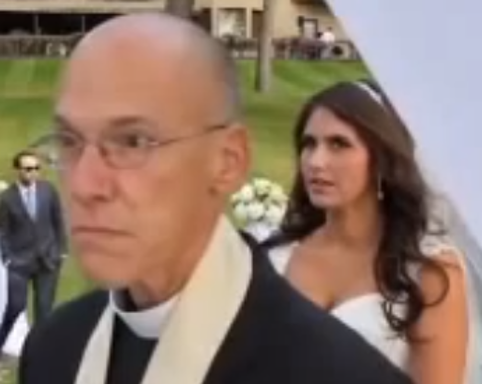 Pastor Presiding Over Wedding Ceremony Stops Ceremony To Address Photographer [VIDEO]