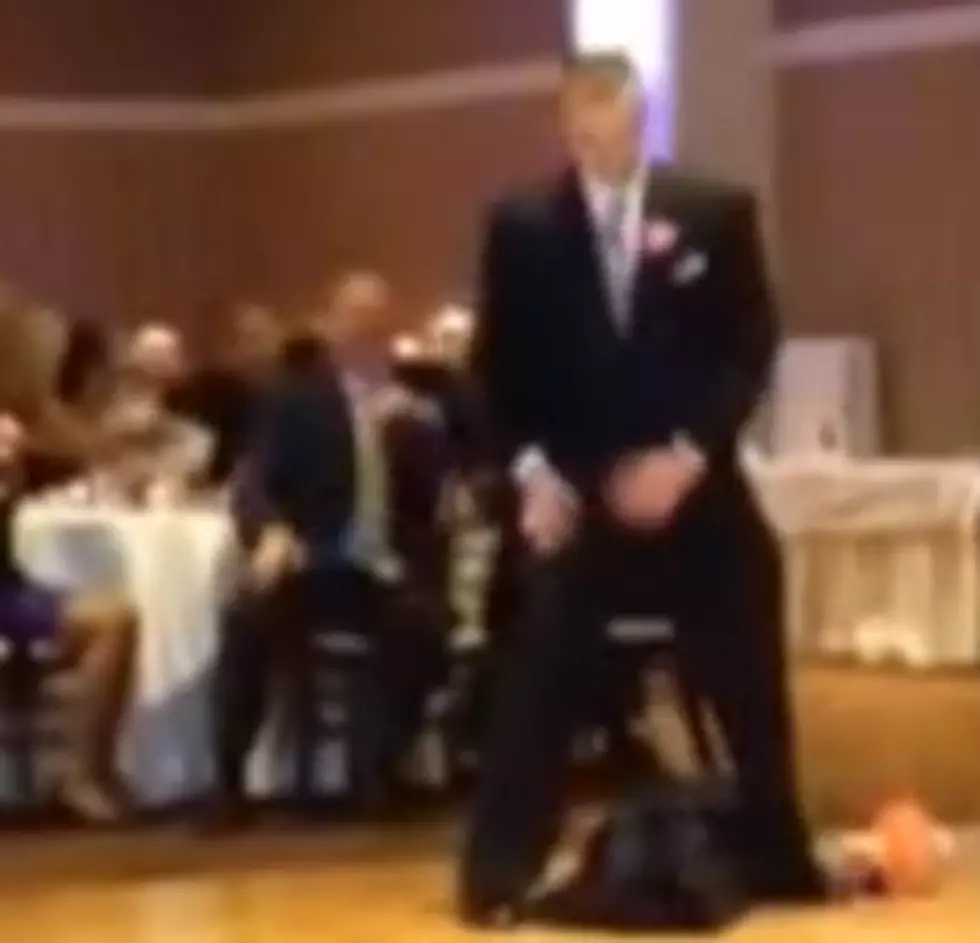 Man Drops The ‘People’s Elbow’ On Wife At Wedding Reception [VIDEO]