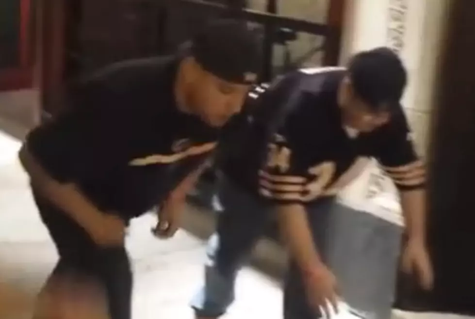 Drunk Chicago Bears Fan Slams Into A Pole While Racing Down Sidewalk [VIDEO]