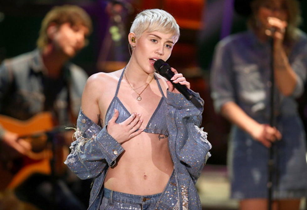 Miley Cyrus Fan Asks Her To Prom, While Wearing Nothing But A Foam Finger [VIDEO]