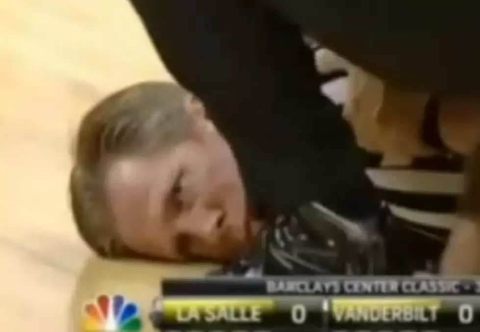 Basketball Referee Knocked Out During Tip-Off [VIDEO]