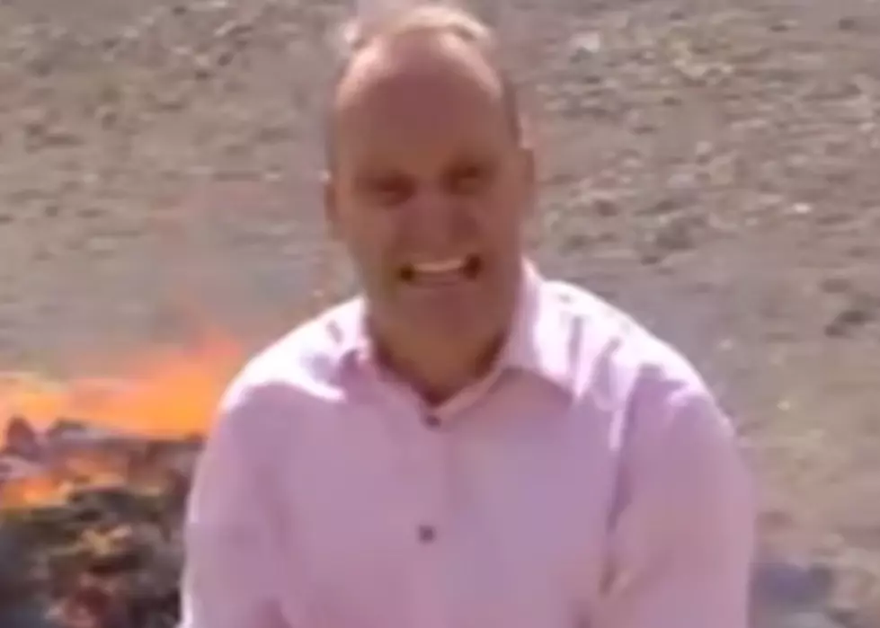 Reporter Can&#8217;t Stop Laughing While Reporting On Drugs Burning Behind Him [VIDEO]