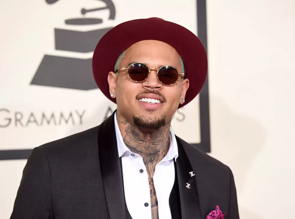 Chris Brown Finds Naked Woman In His Bed