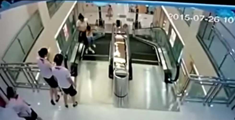 Brave Mom Saves Her Son From Getting Killed By Escalator