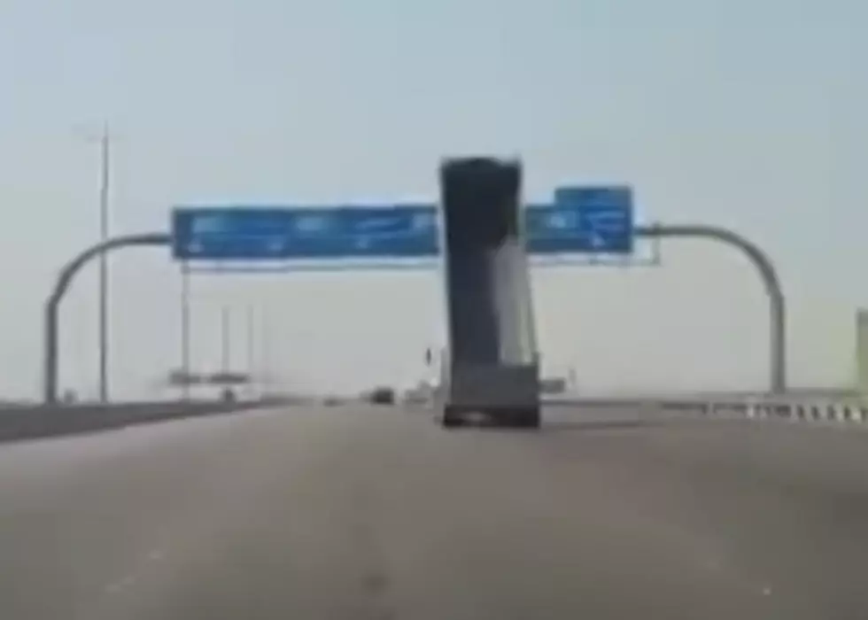 Dump Truck Crashes Into Highway Sign [VIDEO]