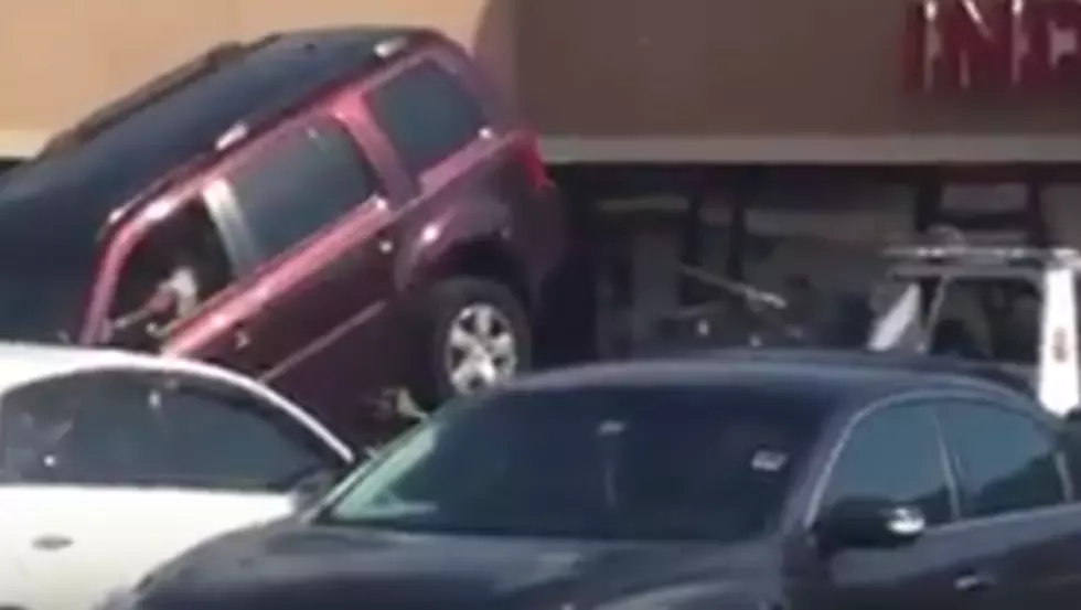 Man Tries To Drive His Truck Off Of A Tow Truck, Fails [VIDEO]