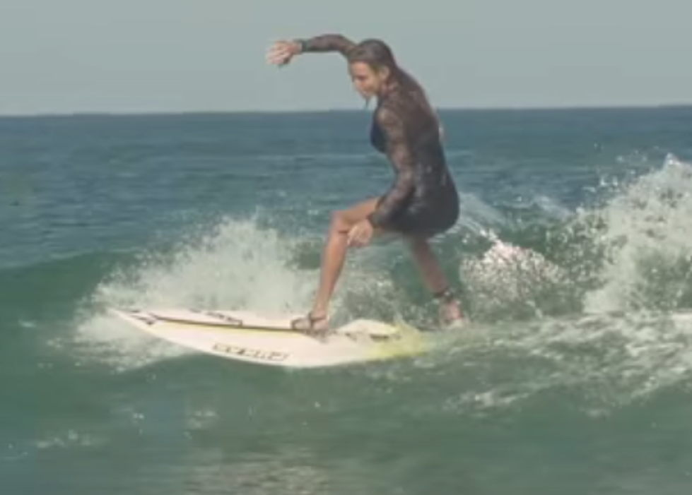 Surfer Hits The Waves While In High Heels [VIDEO]