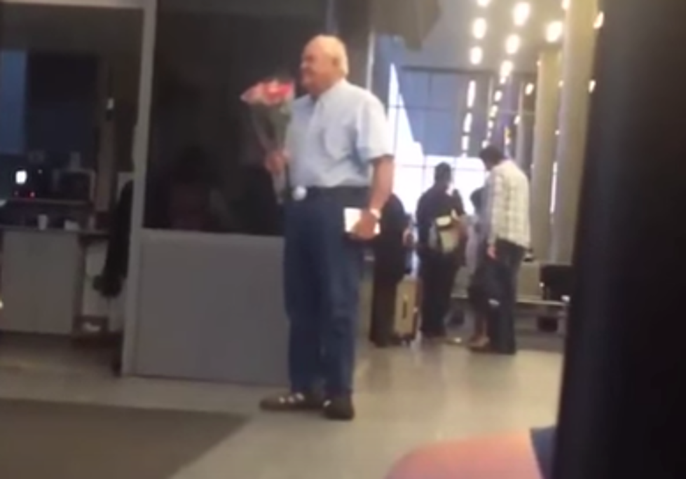 Older Gentleman Gives Wife Flowers At Airport [VIDEO]