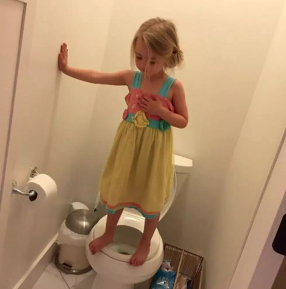 Photo Of Little Girl Standing On Toilet Goes Viral