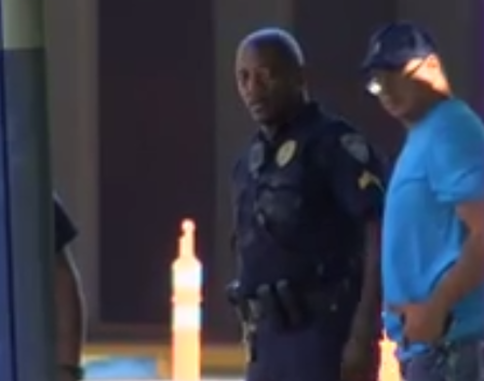 Baton Rouge Police Officers Embrace Each Other After Shooting [VIDEO]