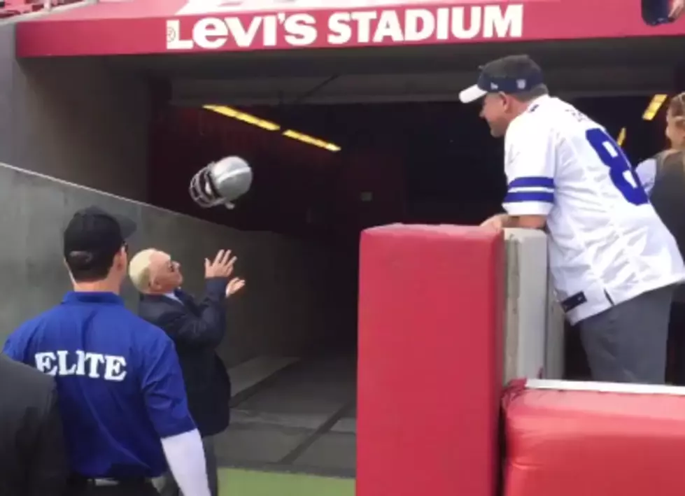 Fan Hits Jerry Jones In Head With Cowboys Helmet [VIDEO]