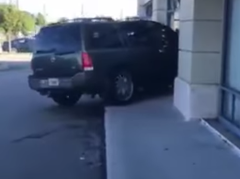 Woman Drives SUV Into T-Mobile Store [VIDEO]