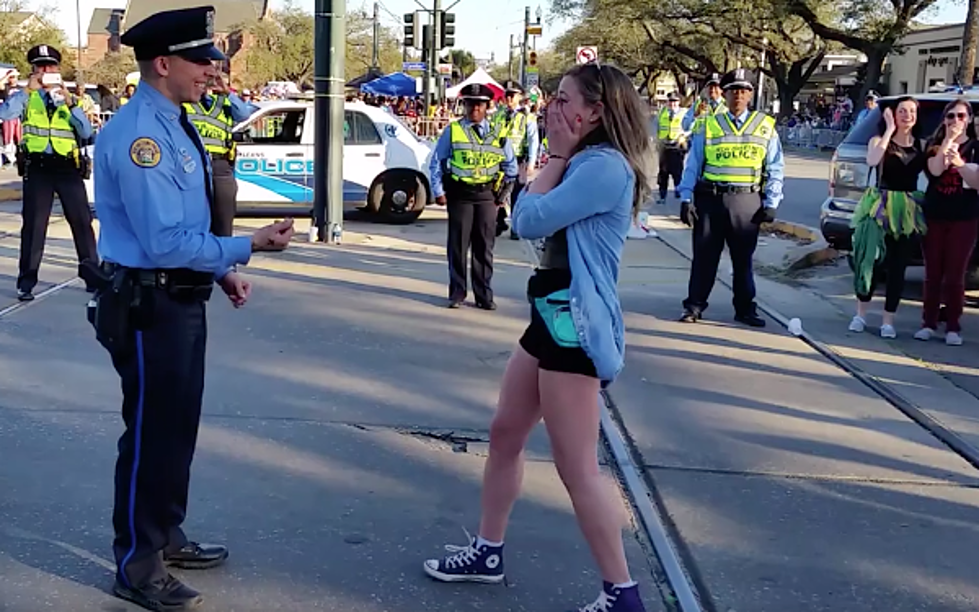 New Orleans Police Officer Proposes To Girlfriend Along Parade Route [VIDEO]