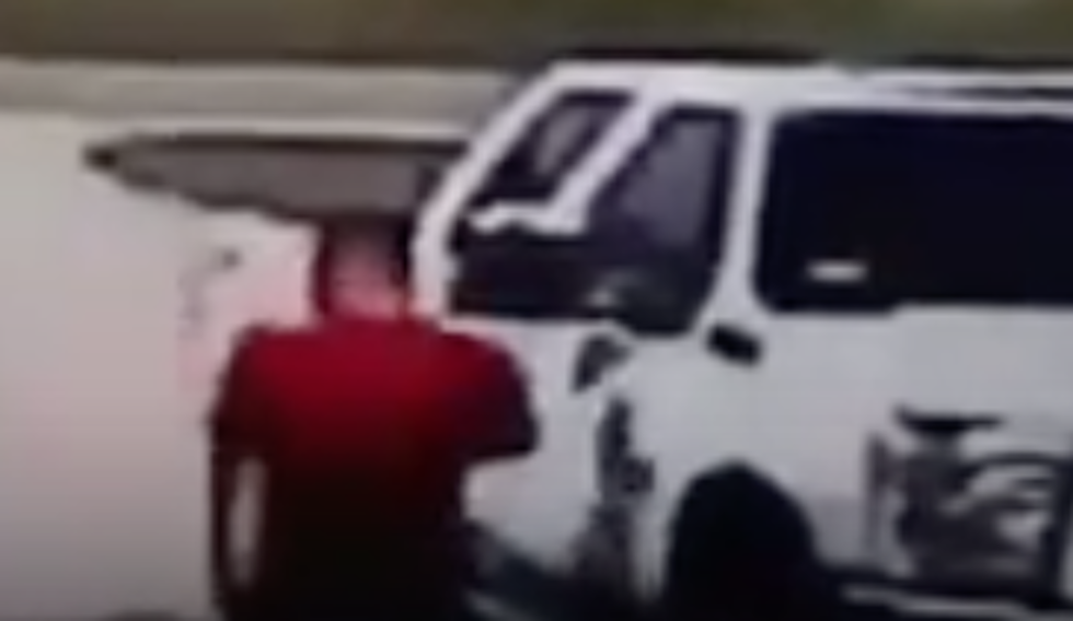 Man Hits Mirror Of Truck, Falls To Ground [VIDEO]