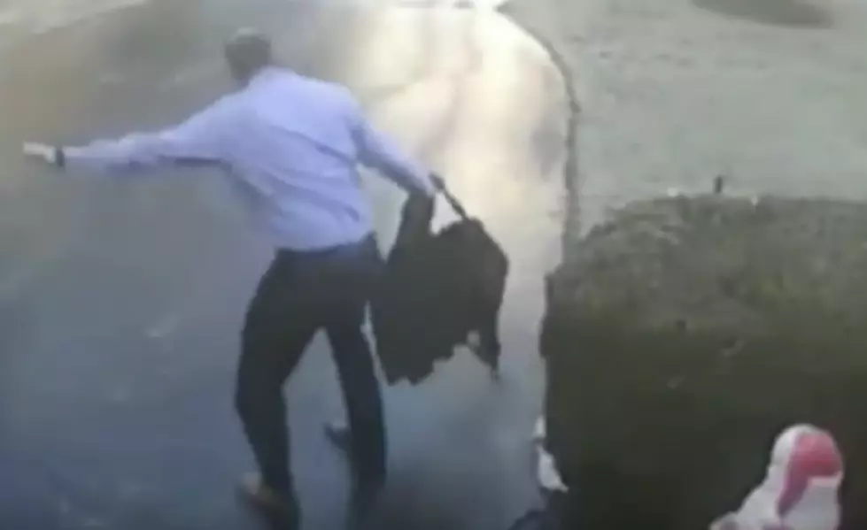 Man Slides Down Driveway That Is Frozen [VIDEO]