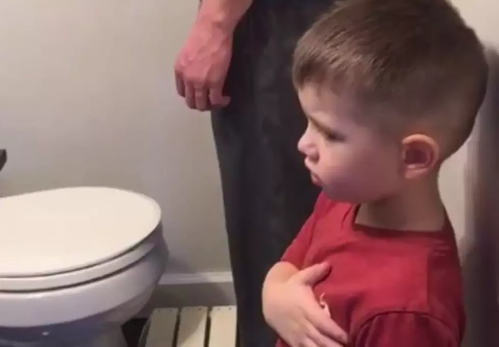 Little Boy Gives Dead Fish A Proper Send Off Playing The National Anthem